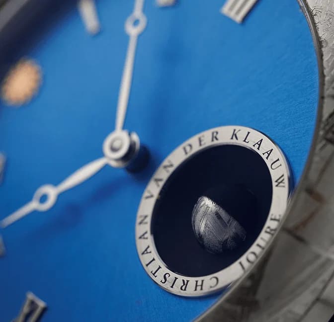 Real Moon aperture on a blue dial