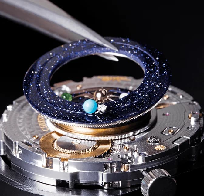 Aventurine ring being fitted to a planetarium module