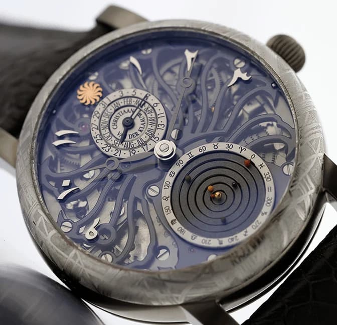 Skeletonised dial with a planetarium display