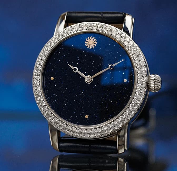 Aventurine dial with a diamond-set case