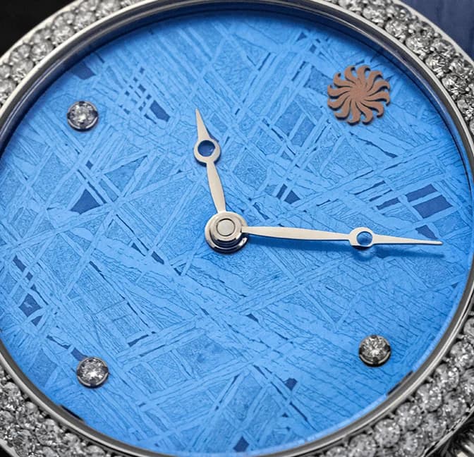 Blue meteorite dial with a diamond-set bezel