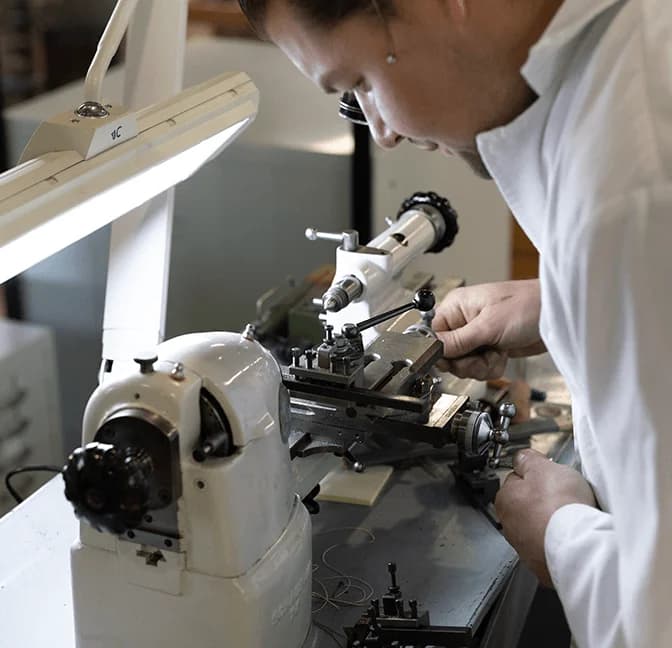 Watchmaker at the lathe