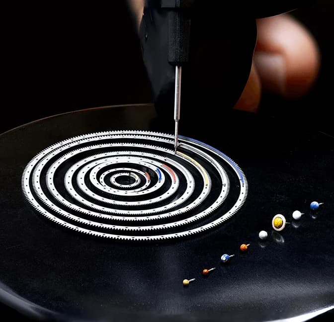 Planetarium rings and planets laid out for assembly