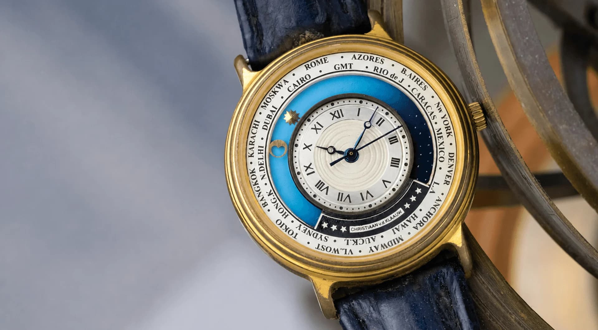 CVDK astronomical watch with a blue and white dial on a blue strap