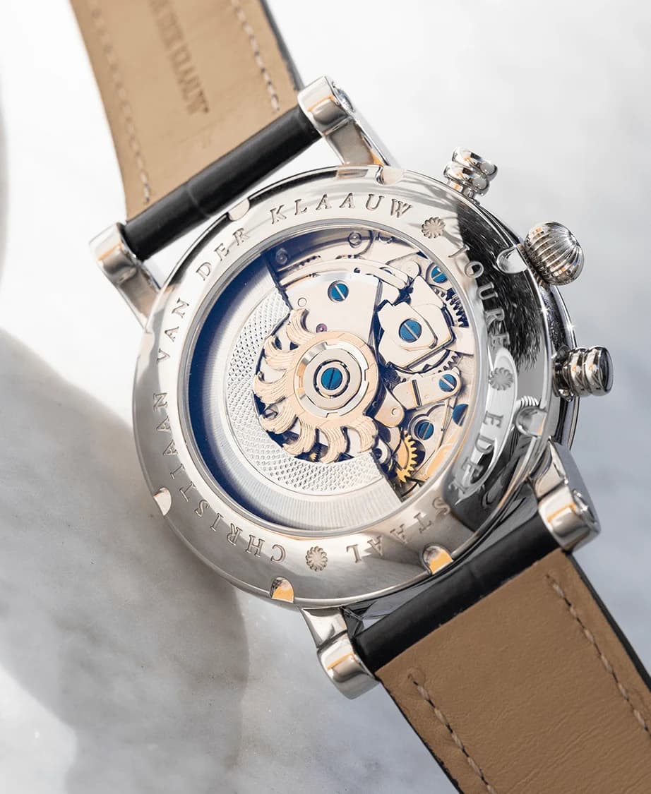 The CVDK7758 movement through the sapphire caseback
