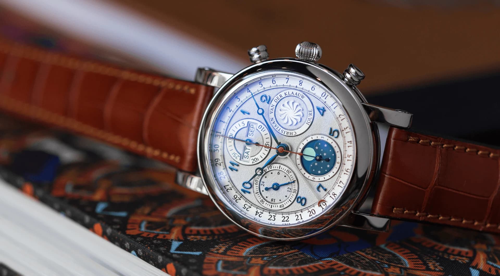 Ariadne White chronograph with a white dial, blue indexes and the moon phase at 6 o’clock