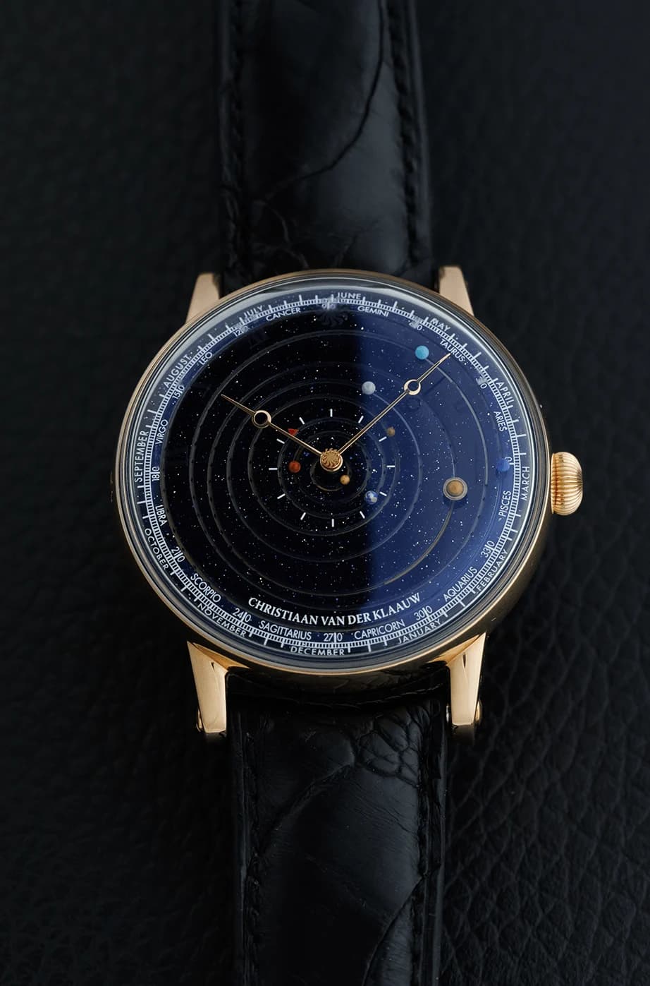 Grand Planetarium Eccentric on a black ostrich leather strap