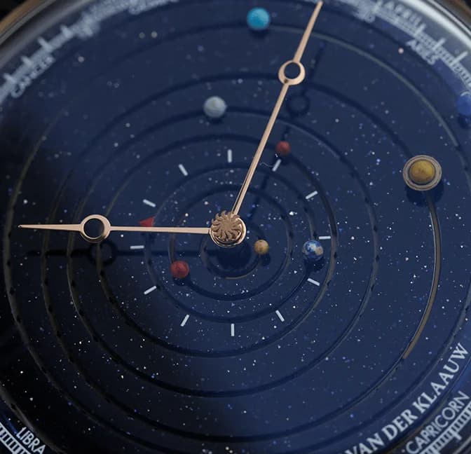 Close-up of the aventurine dial with the hand-painted planets