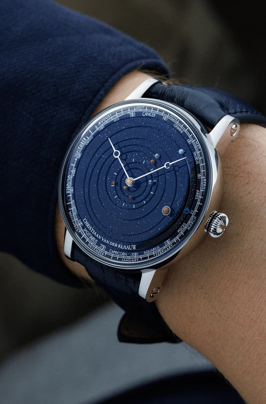 Grand Planetarium Eccentric in platinum on a blue ostrich leather strap