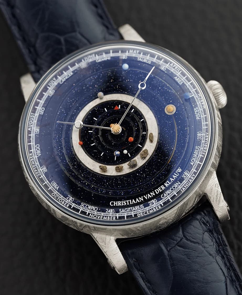 Grand Planetarium Eccentric Meteorite dial with hours, minutes, date and zodiac