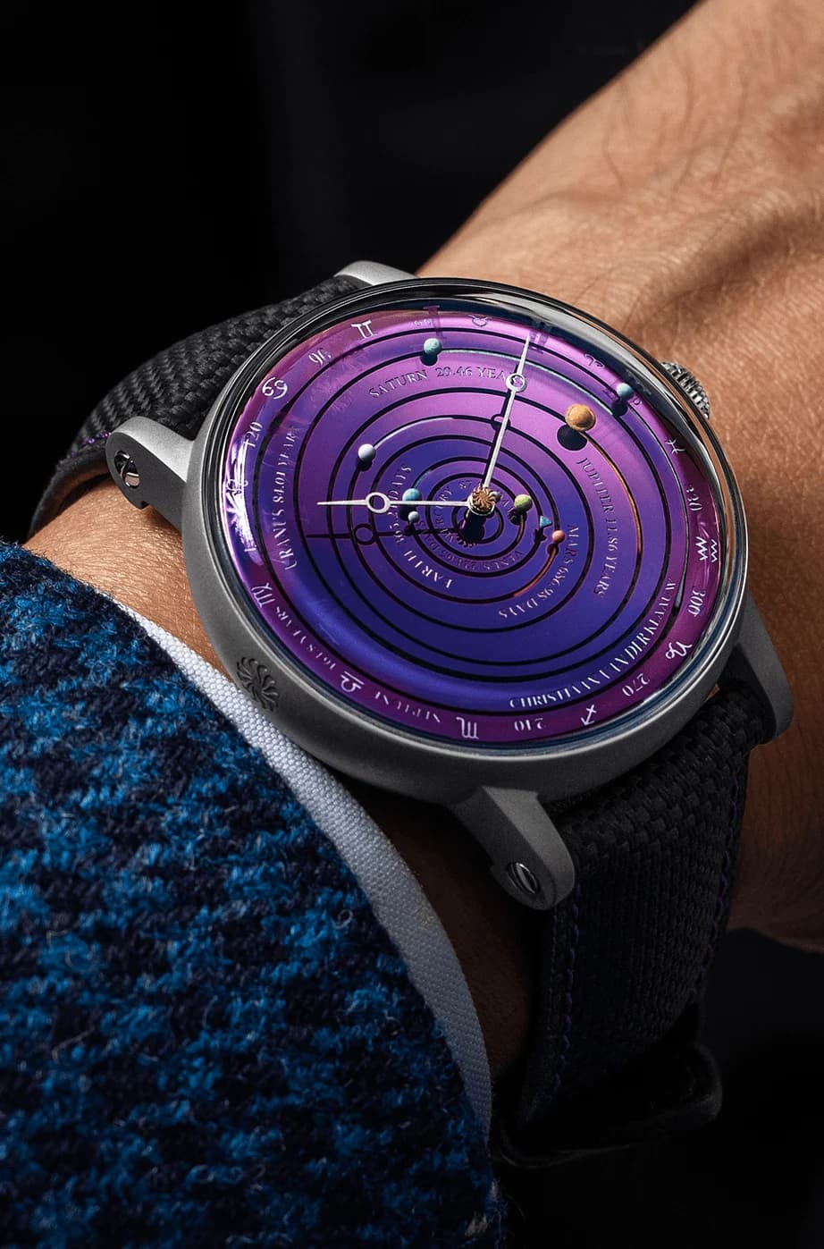 Grand Planetarium Eccentric Si14 on a black canvas leather strap