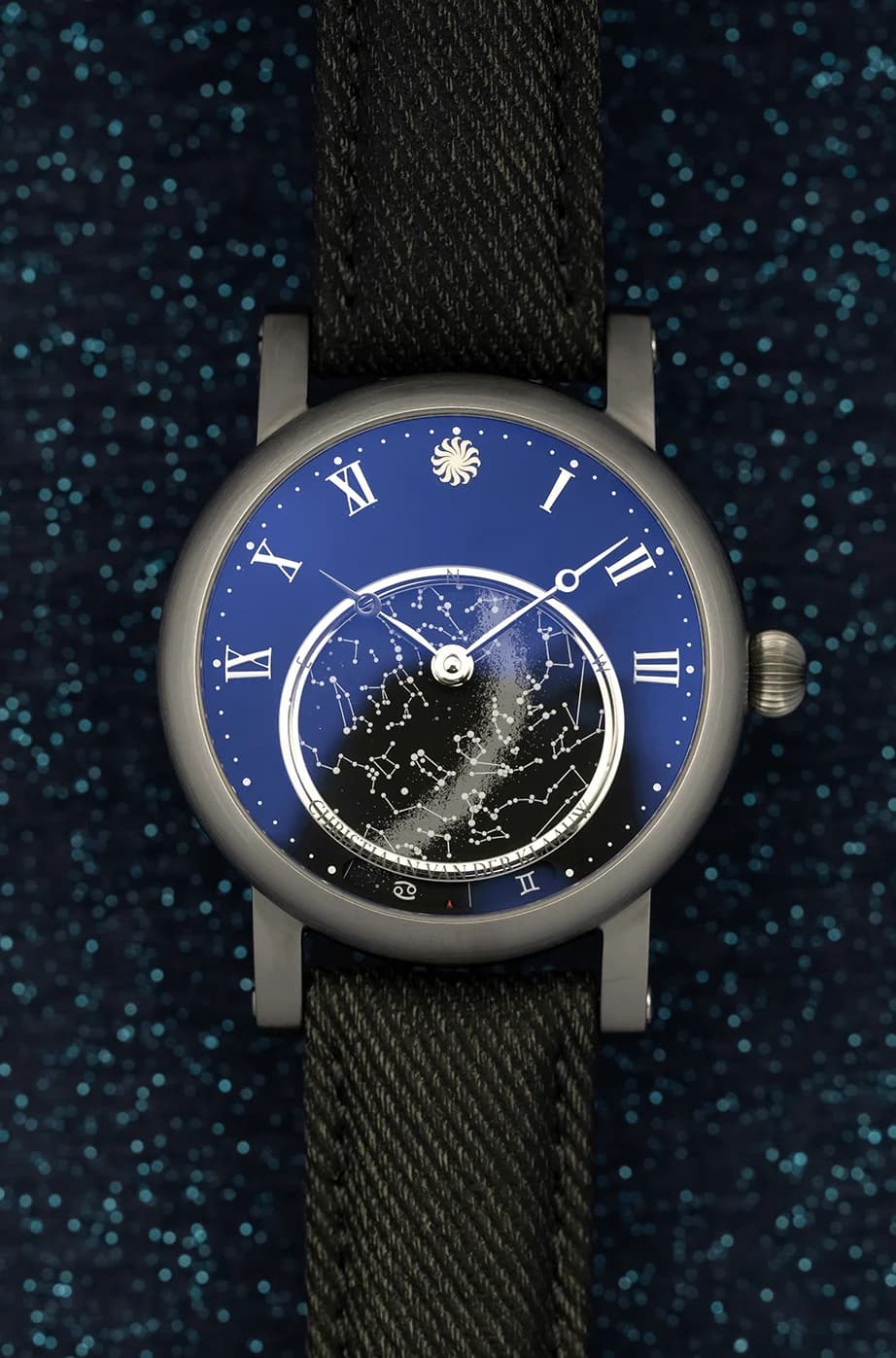 Orion Matt Black, front view against a starry backdrop
