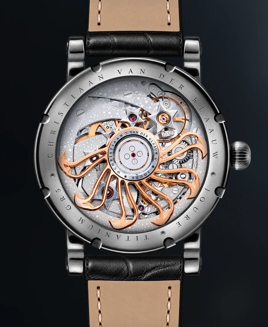 The CKM-01 Manufacture movement through the caseback