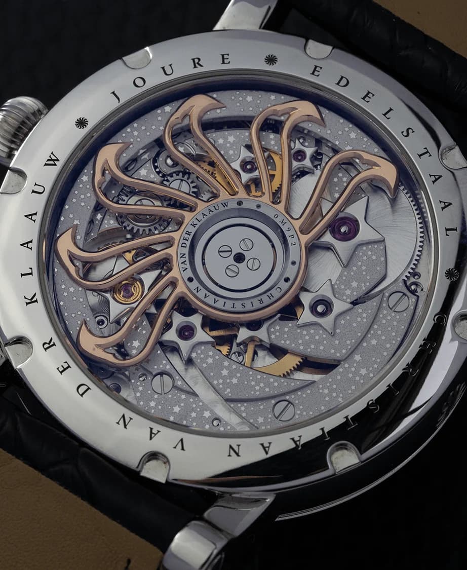 The CKM-01 Manufacture movement through the sapphire caseback