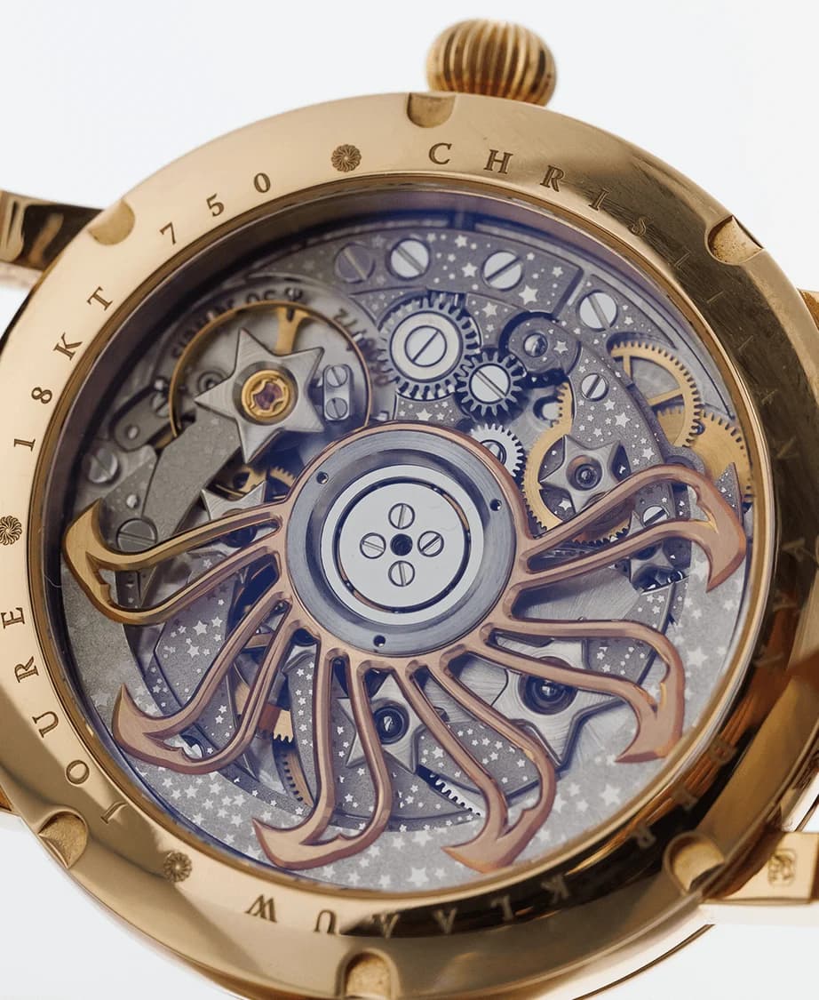 The CKM-01 Manufacture movement through the sapphire caseback