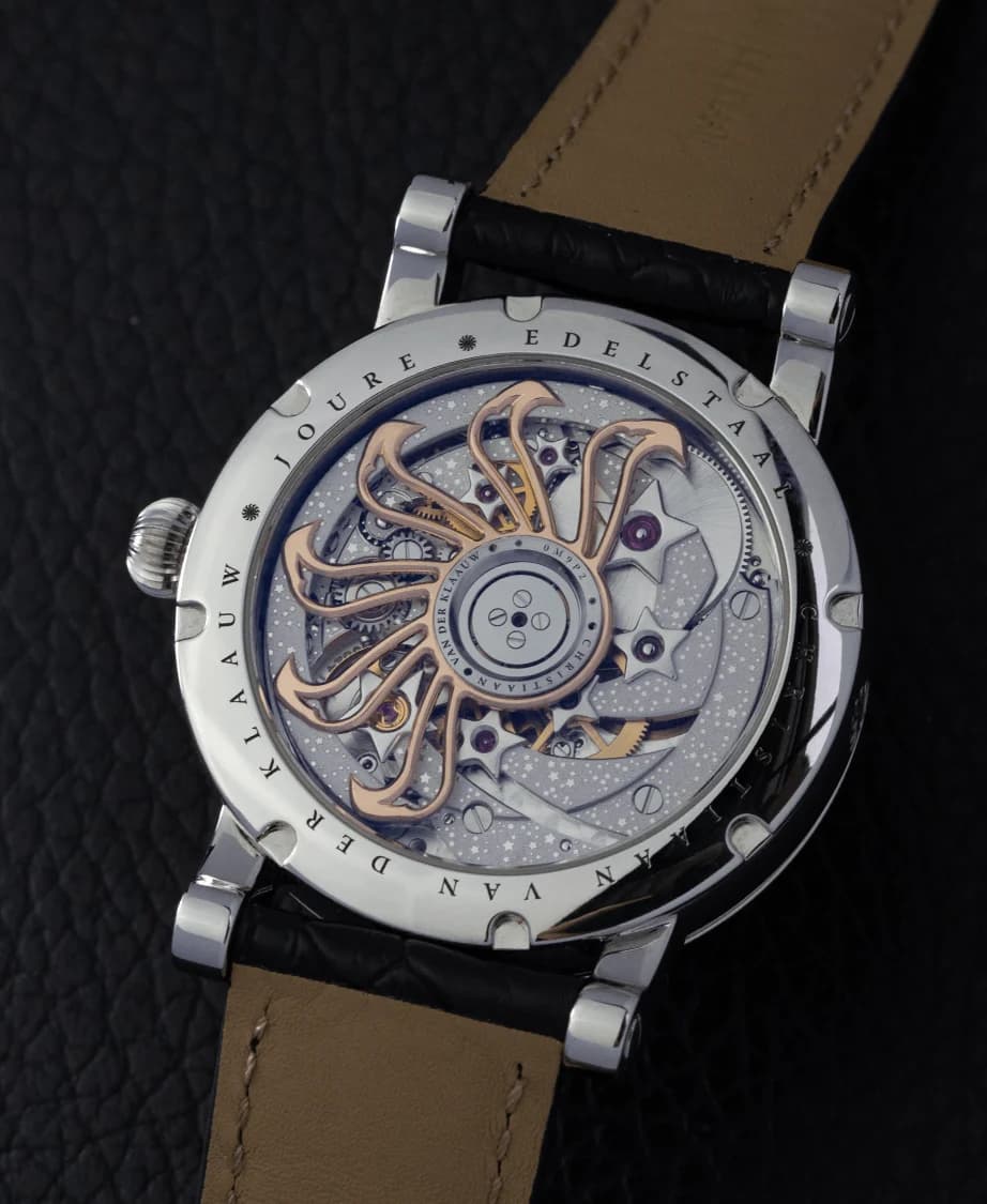 The CKM-01 Manufacture movement through the sapphire caseback