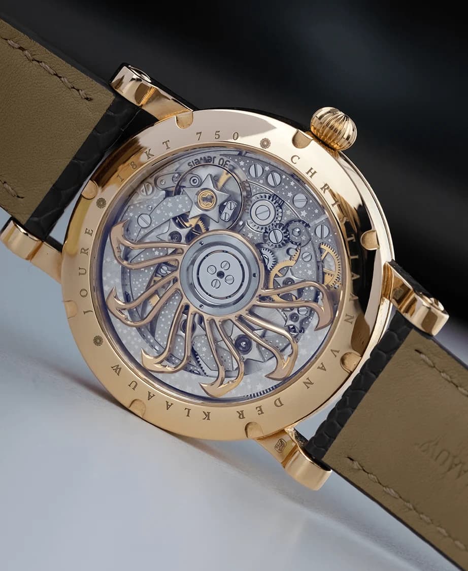 The CKM-01 Manufacture movement through the sapphire caseback