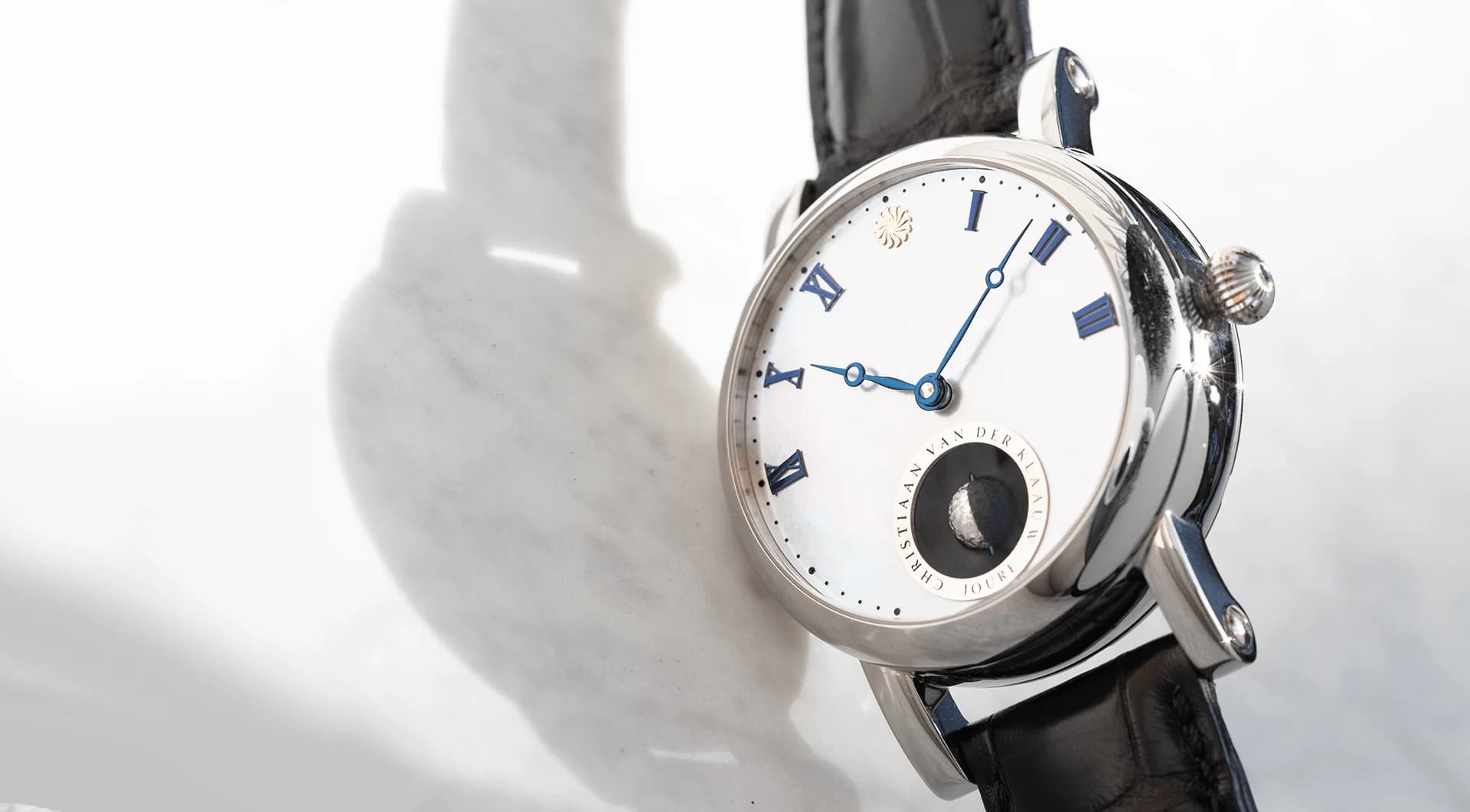 Real Moon Joure Guilloché White White Gold with its three-dimensional Moon
