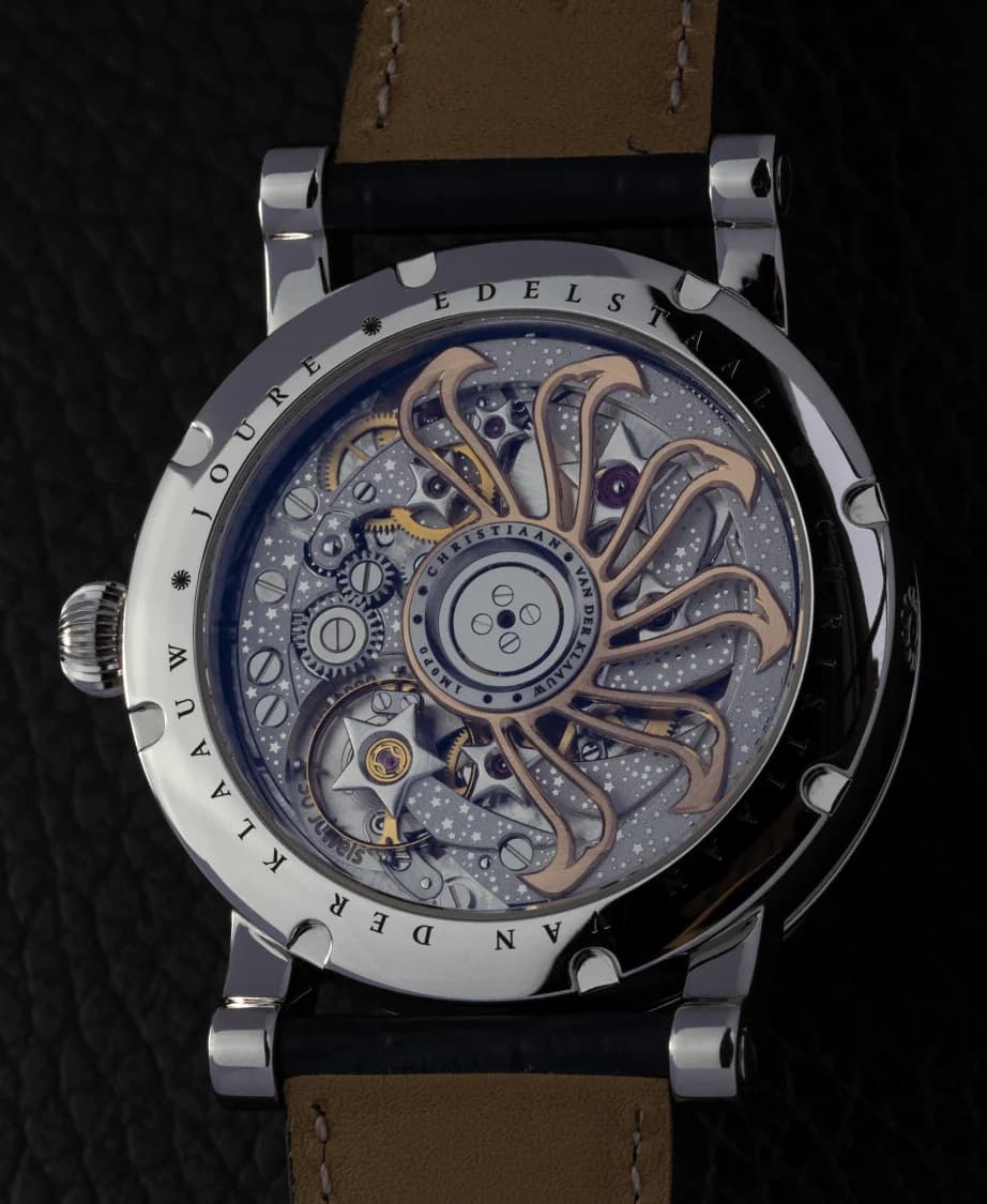The CKM-01 Manufacture movement through the sapphire caseback
